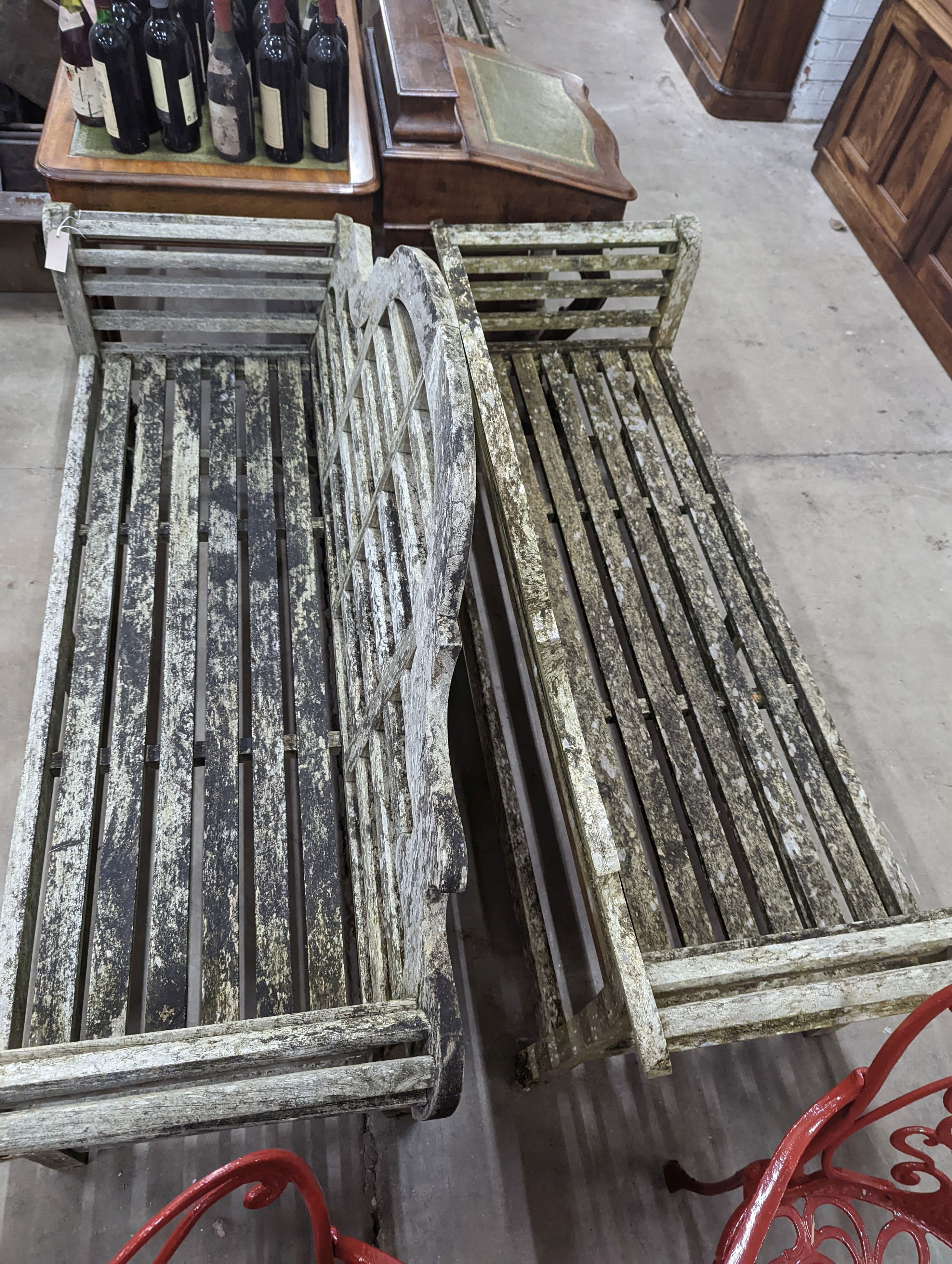 A pair of Lutyens design weathered teak garden benches, length 167cm, depth 58cm, height 104cm